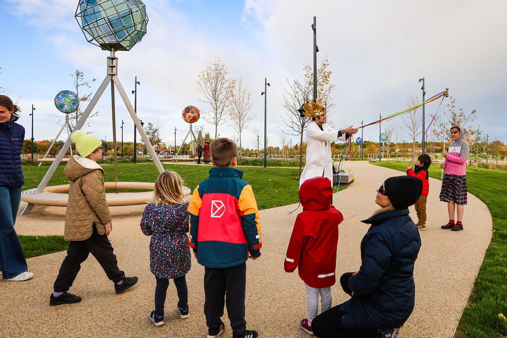 Children walking the trail through the new public park